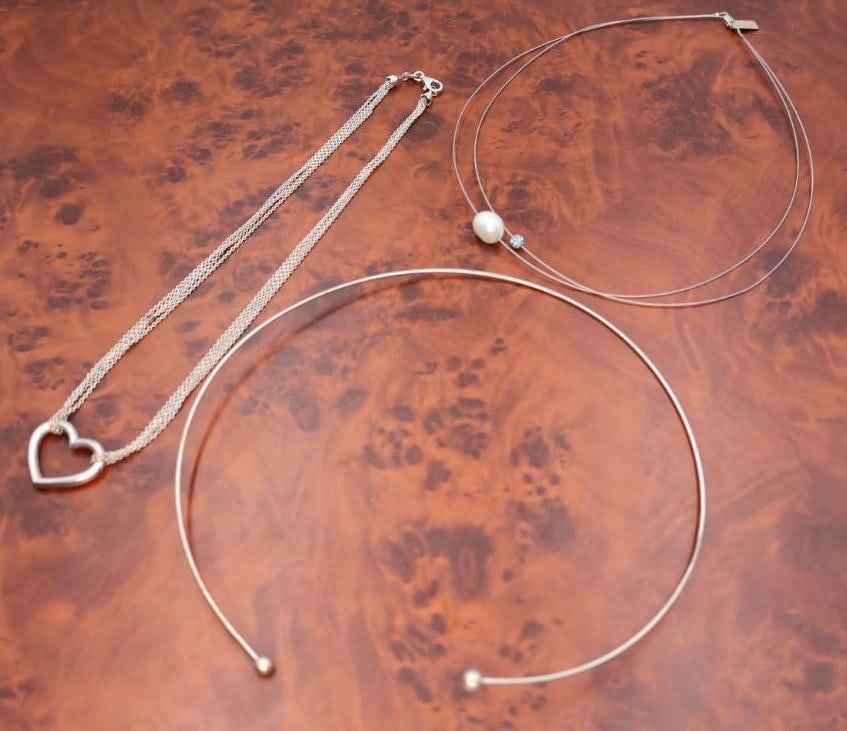 Collection of silver chokers, including Silver Stiff Choker - 2