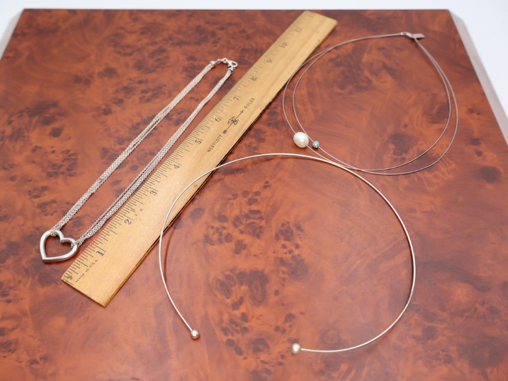 Collection of silver chokers, including Silver Stiff Choker - 3