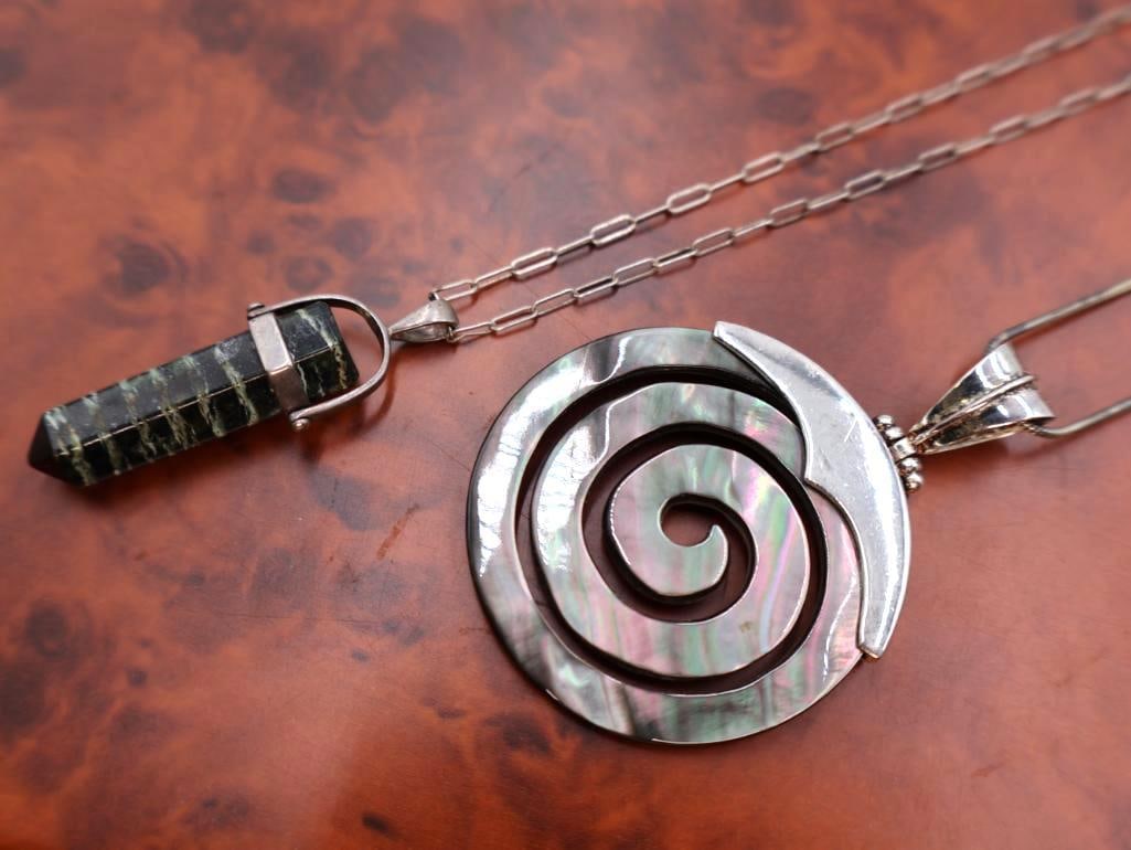 Sterling silver spiral pendant & pendant necklace featuring a dark green stone obelisk (1 of 8)