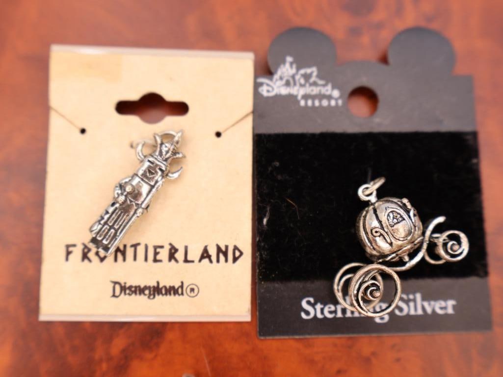 Collection of Disney-themed charms and Vintage Pirates Medallion - 10