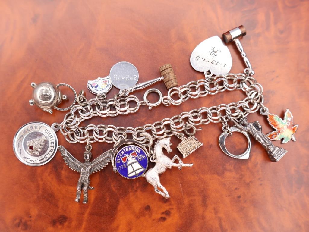 Vintage sterling silver charm bracelet with assorted charms (1 of 9)