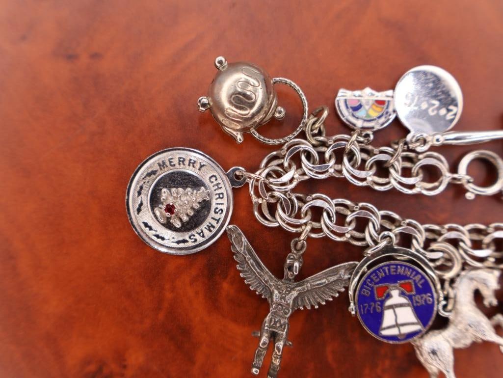 Vintage sterling silver charm bracelet with assorted charms - 3