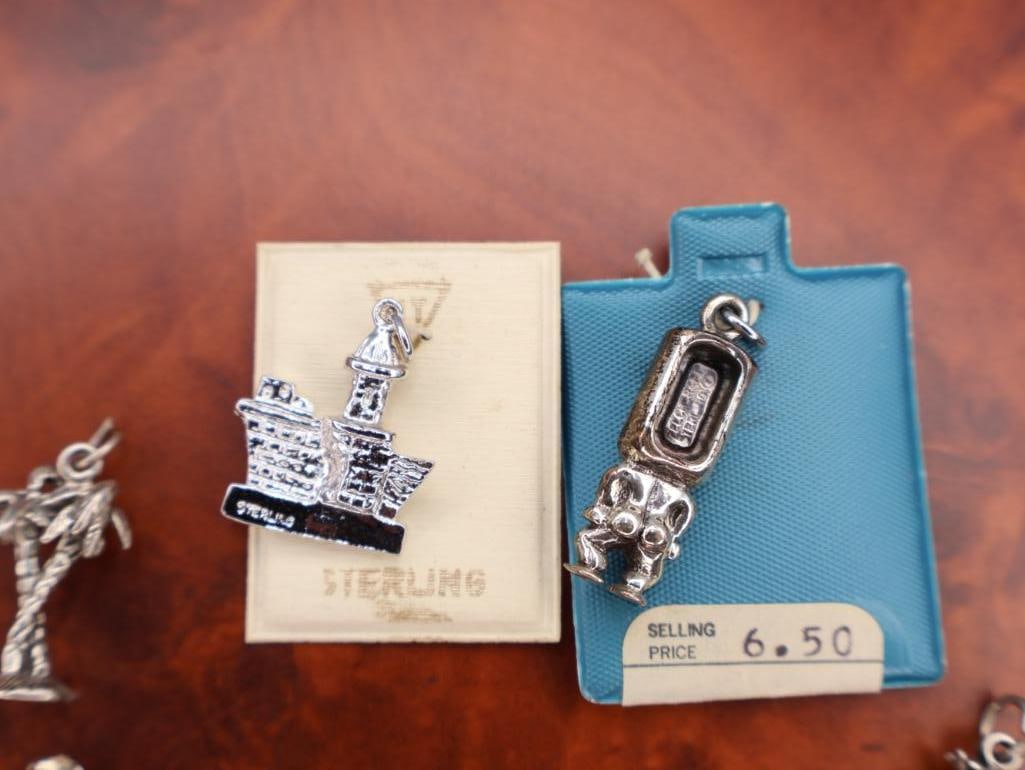 Collection of assorted sterling silver travel and souvenir charms - 6