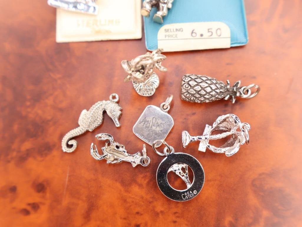 Collection of assorted sterling silver travel and souvenir charms - 7