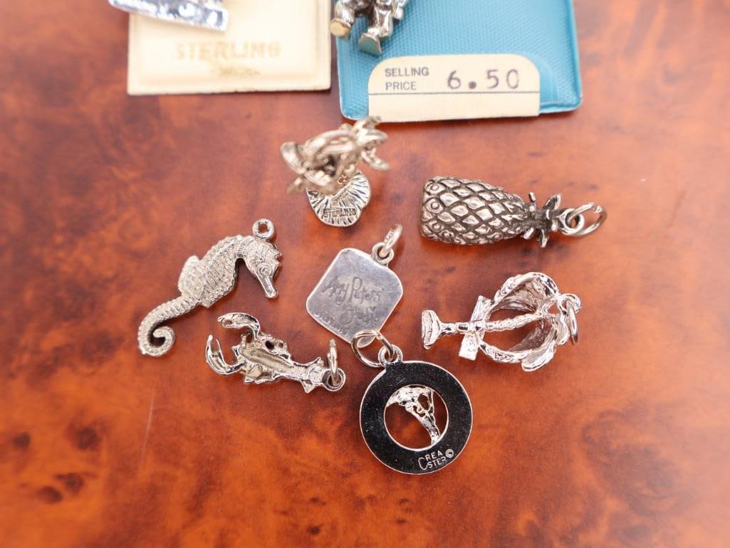Collection of assorted sterling silver travel and souvenir charms - 8