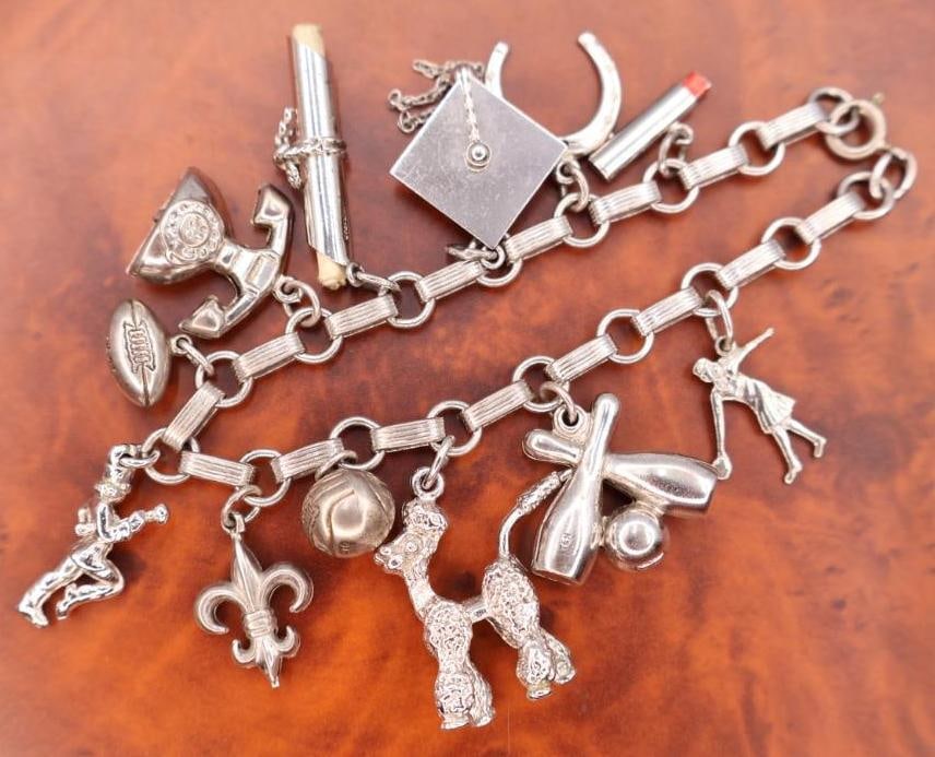 Vintage sterling silver charm bracelet (1 of 9)