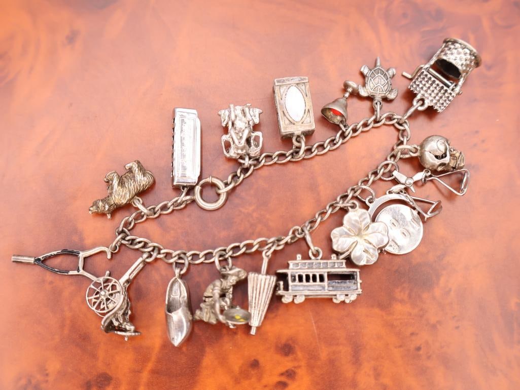 Vintage sterling silver charm bracelet (1 of 9)