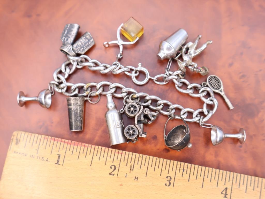 Vintage sterling silver charm bracelet with various novelty and cocktail-themed charms. - 2