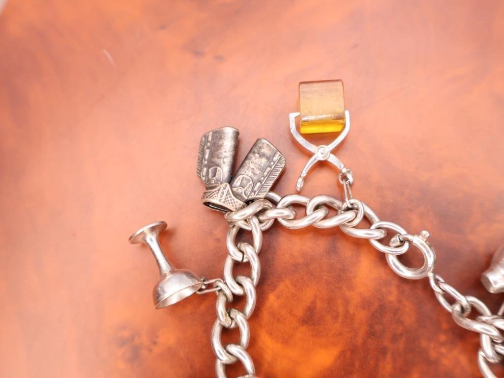Vintage sterling silver charm bracelet with various novelty and cocktail-themed charms. - 3