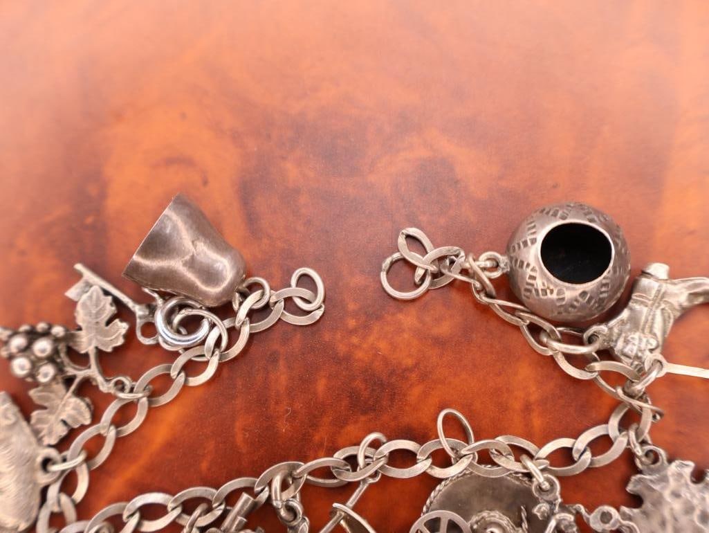 Vintage sterling silver charm bracelet - 7
