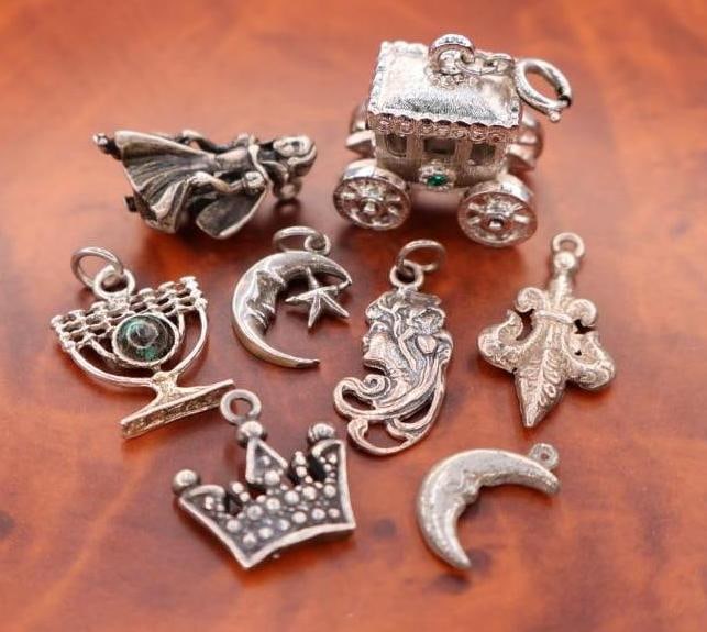 Collection of antique silver-tone charm pendants (1 of 6)