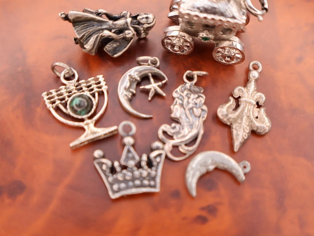 Collection of antique silver-tone charm pendants - 3