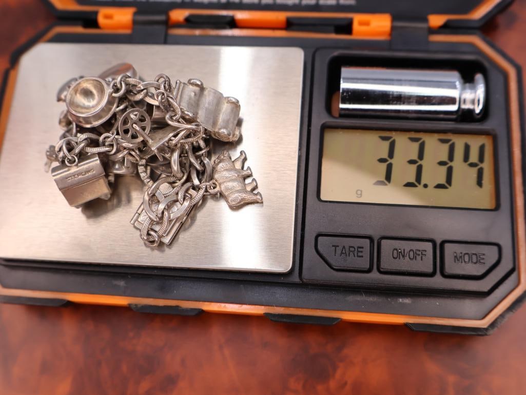Vintage sterling silver charm bracelet - 9