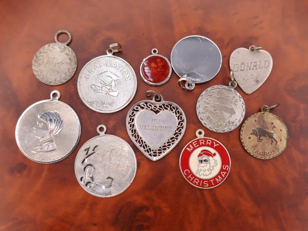 Collection of vintage sterling silver medallion bracelet charms or pendants (1 of 11)