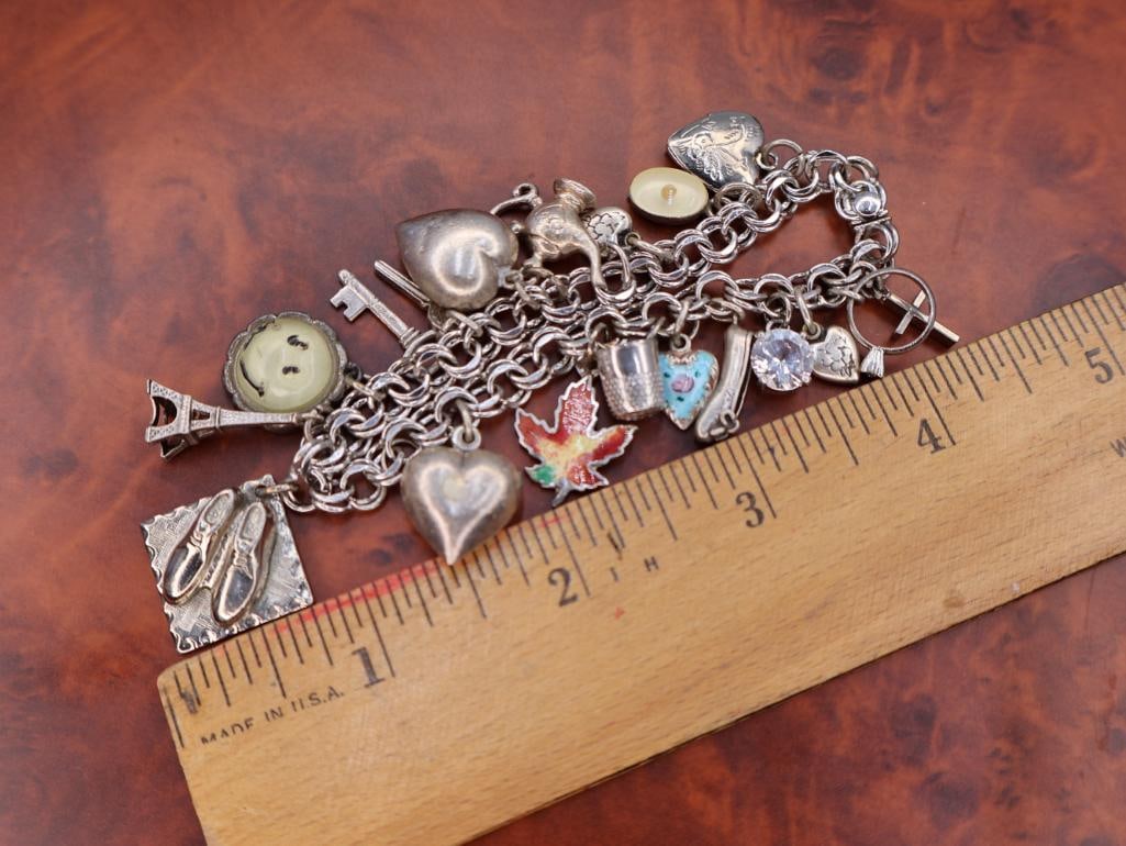 Vintage sterling silver charm bracelet with assorted charms - 2