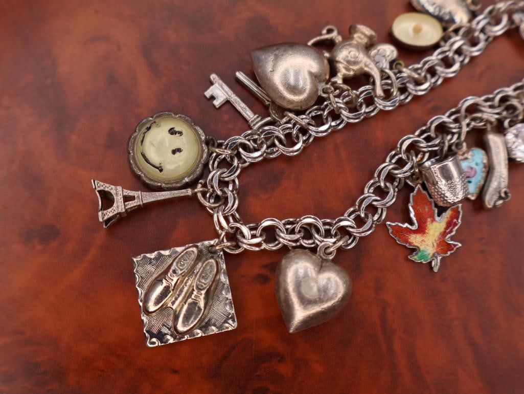 Vintage sterling silver charm bracelet with assorted charms - 3