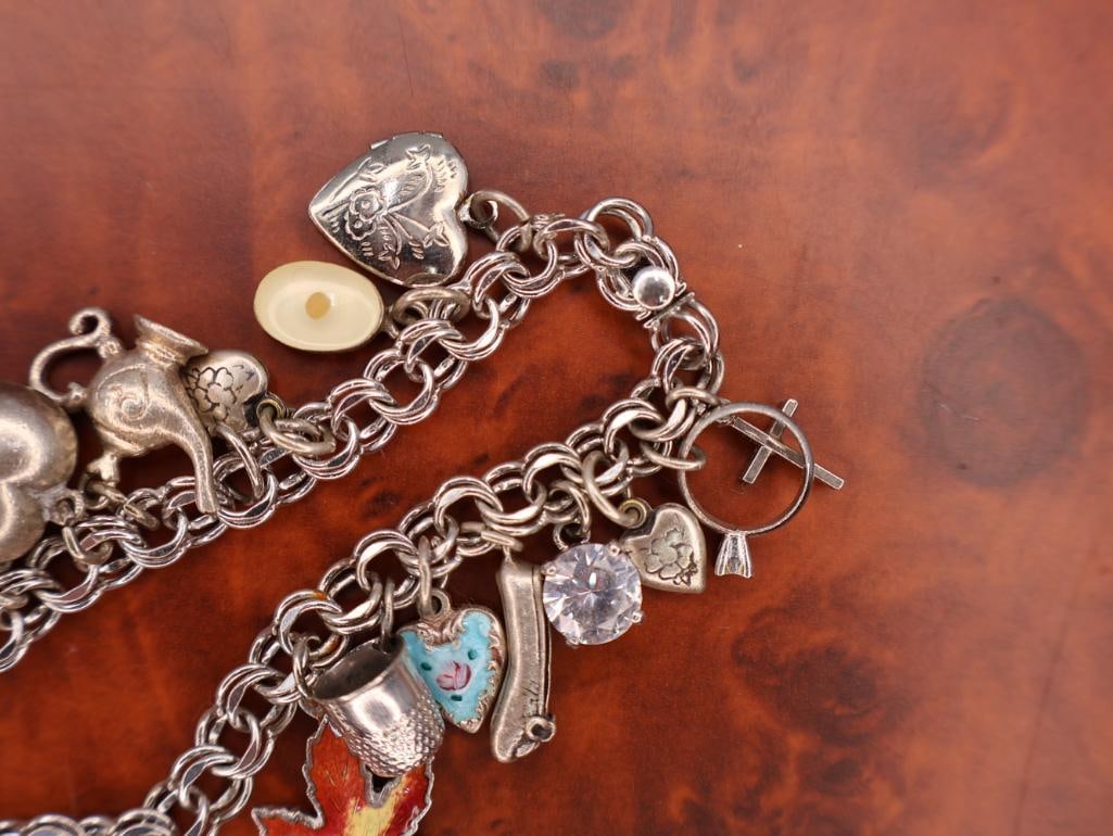 Vintage sterling silver charm bracelet with assorted charms - 5