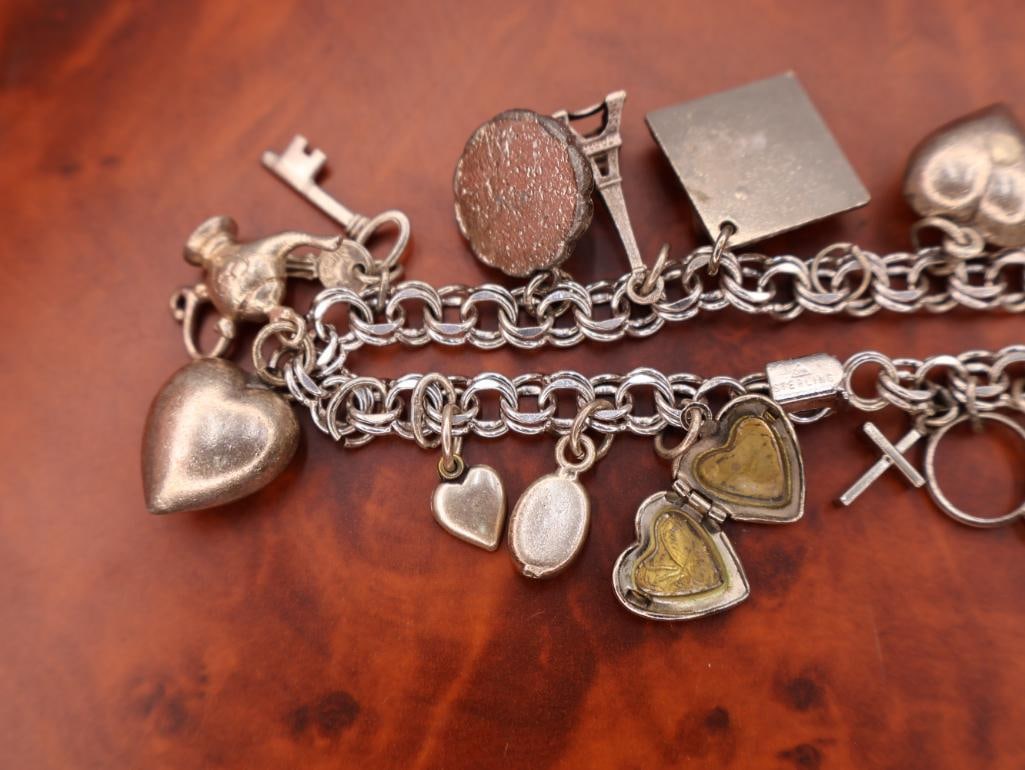 Vintage sterling silver charm bracelet with assorted charms - 8