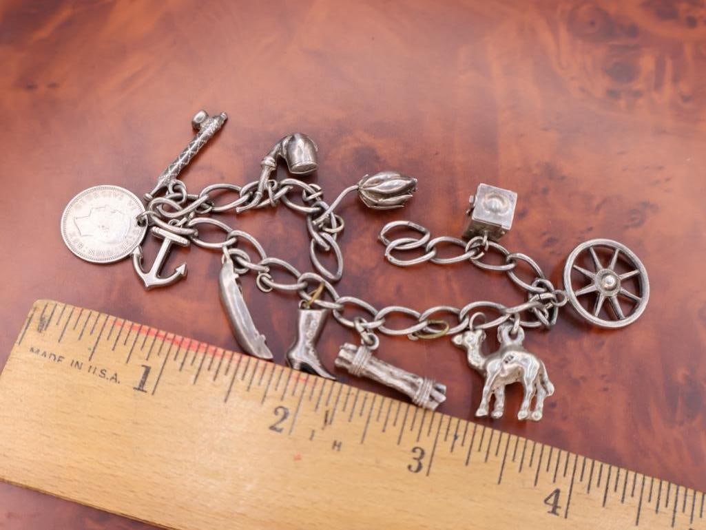 Vintage silver charm bracelet with assorted charms - 2
