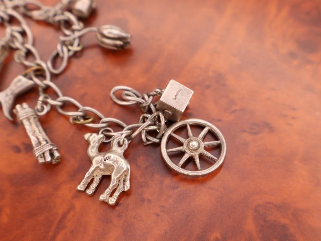 Vintage silver charm bracelet with assorted charms - 3