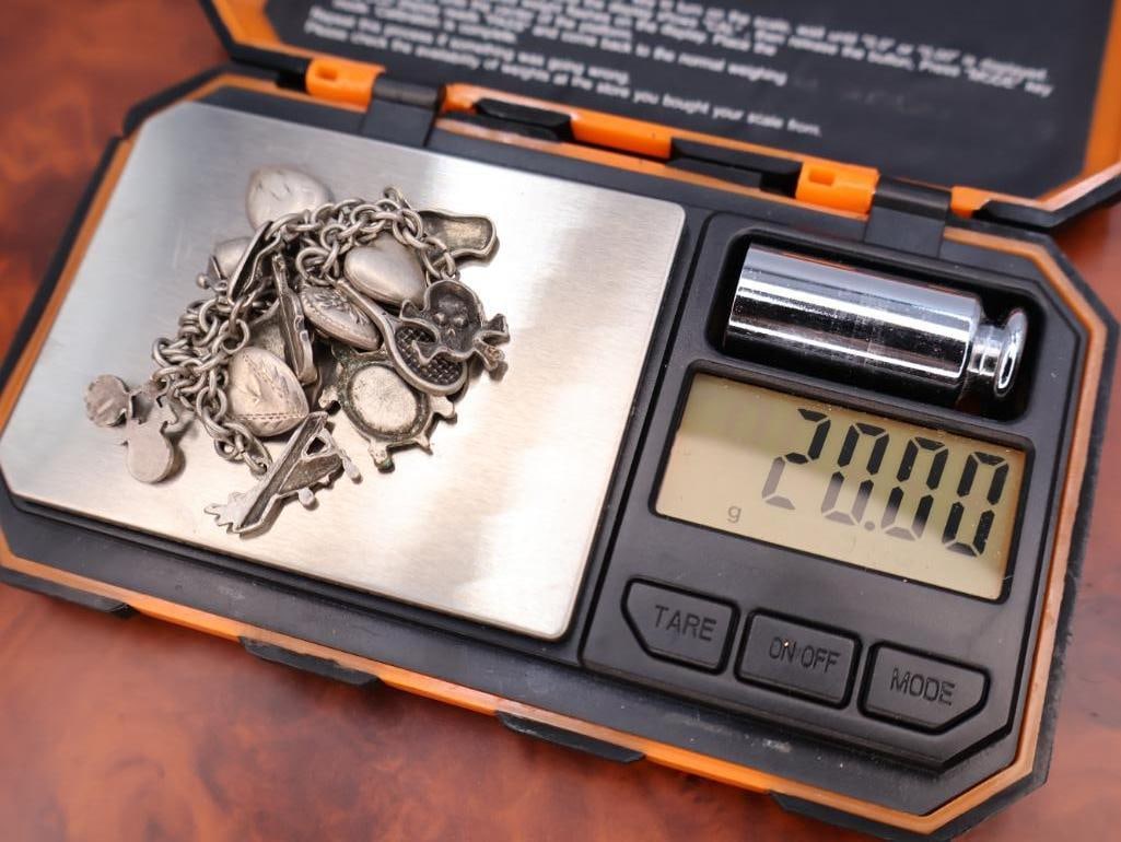 Vintage sterling silver charm bracelet with assorted charms - 7