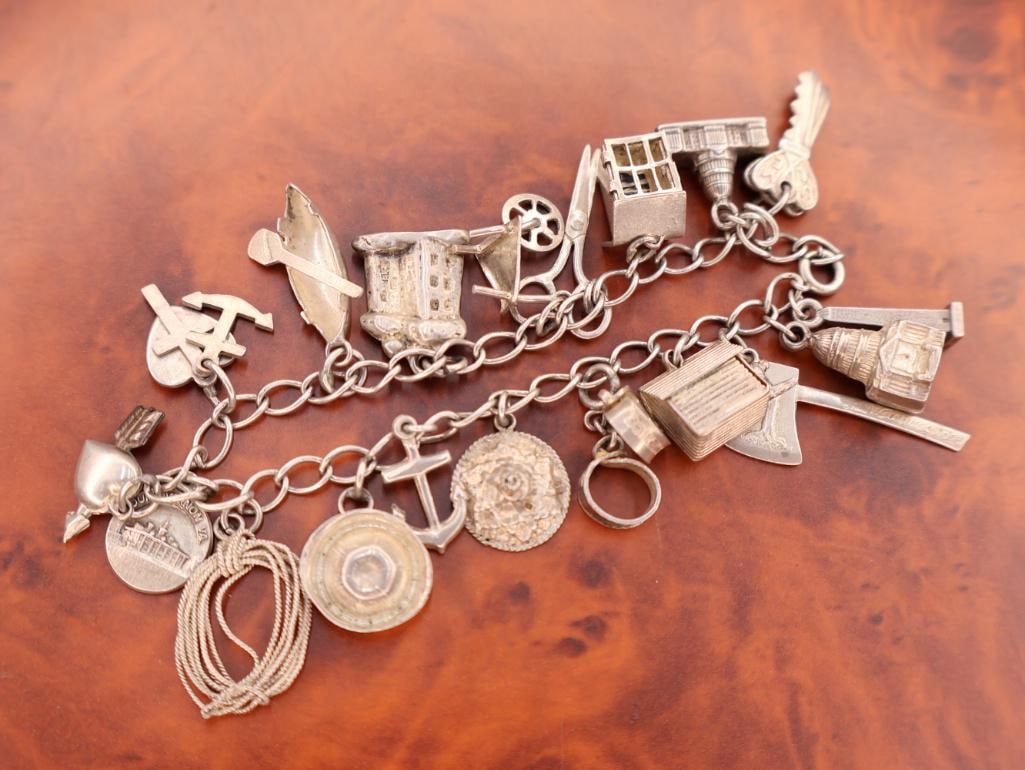 Vintage silver charm bracelet with assorted charms (1 of 12)