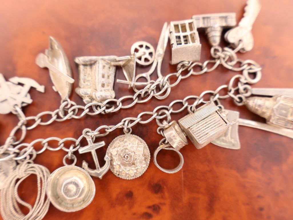 Vintage silver charm bracelet with assorted charms - 4