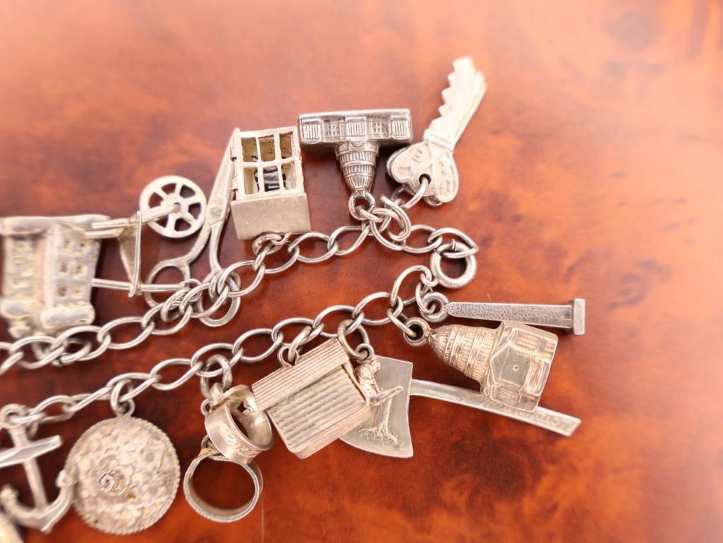 Vintage silver charm bracelet with assorted charms - 5