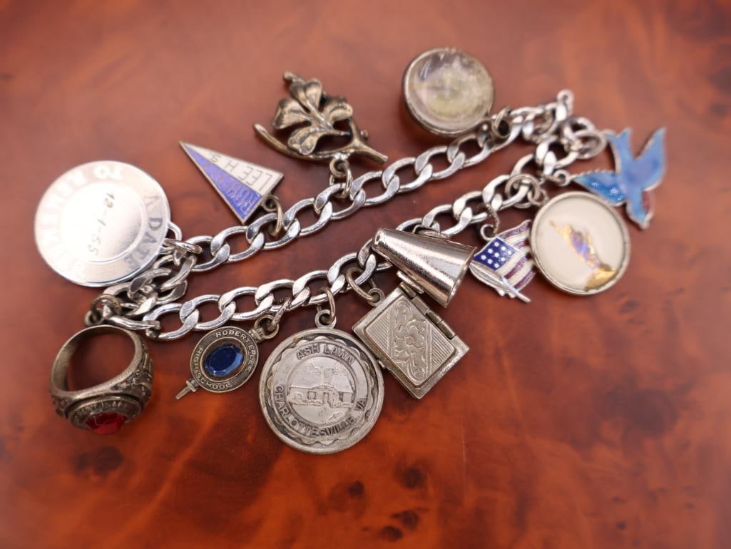 Vintage sterling silver charm bracelet with numerous charms (1 of 8)