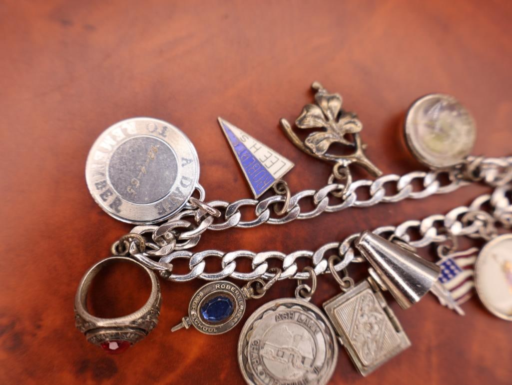 Vintage sterling silver charm bracelet with numerous charms - 3