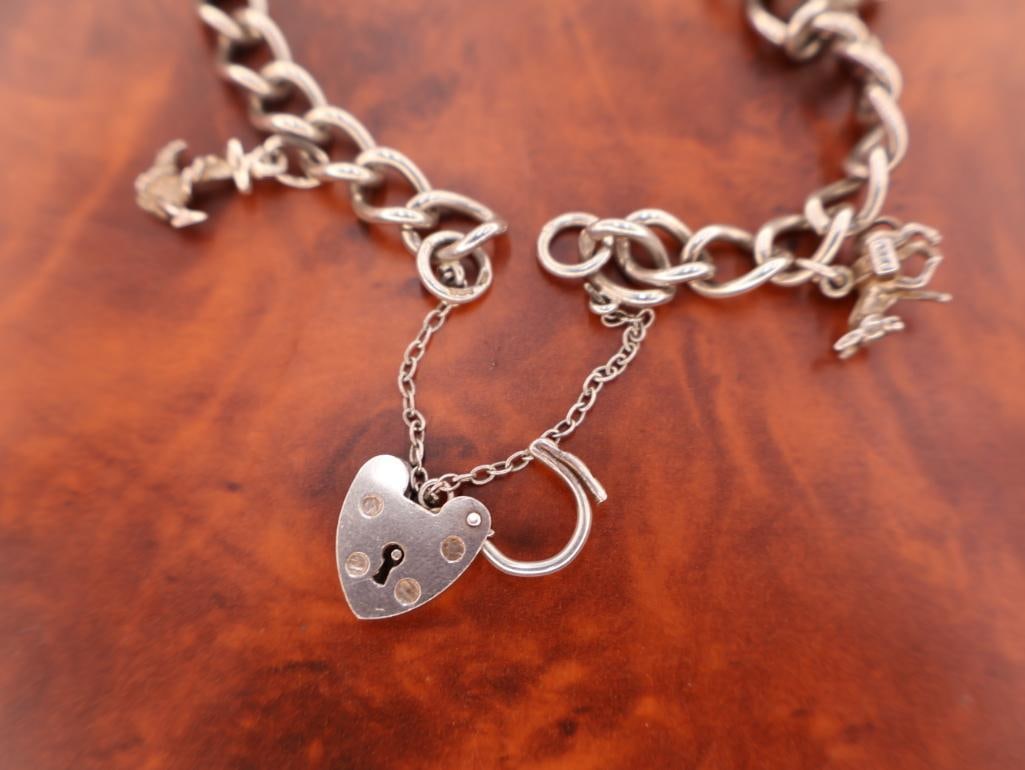 Vintage sterling silver charm bracelet - 7