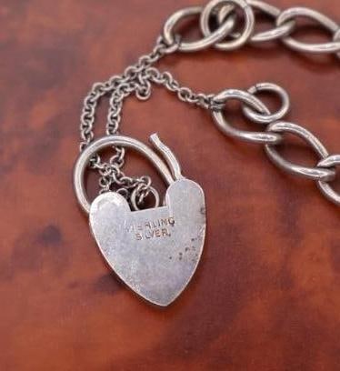 Two sterling silver charm bracelets - 7