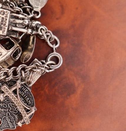 Vintage sterling silver charm bracelet with lots of Charms Including 14k Gold Florida Charm - 11