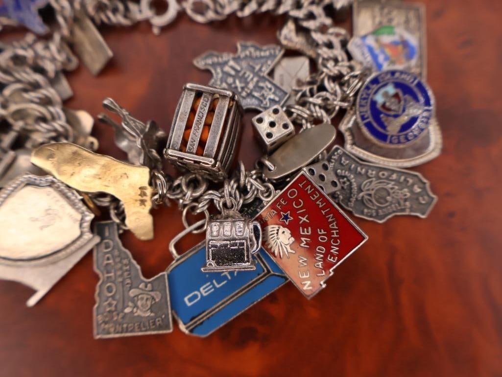Vintage sterling silver charm bracelet with lots of Charms Including 14k Gold Florida Charm - 9