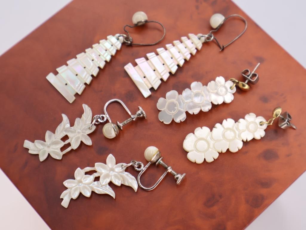A collection of mother-of-pearl earrings (1 of 6)
