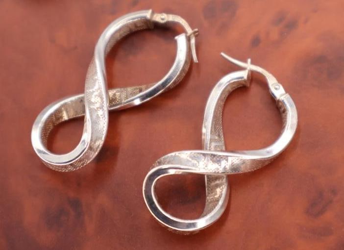 Three pairs of sterling silver earrings - 7
