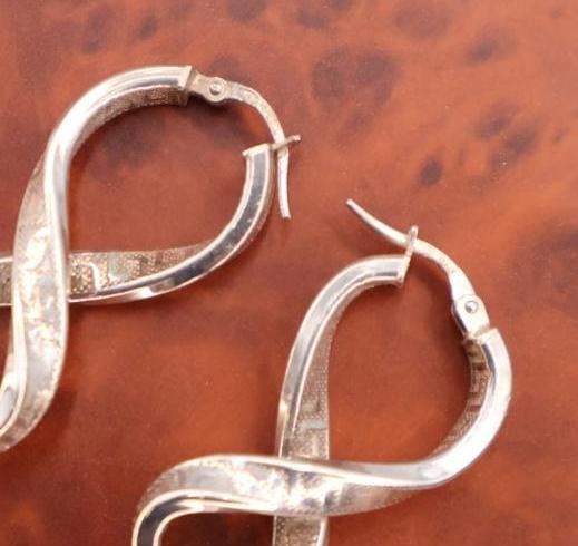 Three pairs of sterling silver earrings - 8