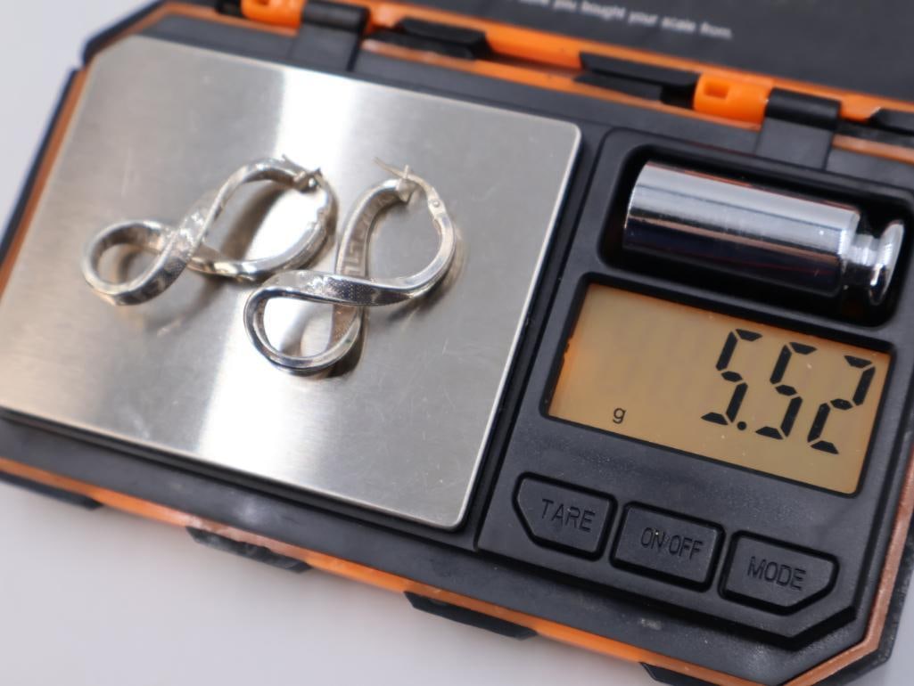 Three pairs of sterling silver earrings - 9