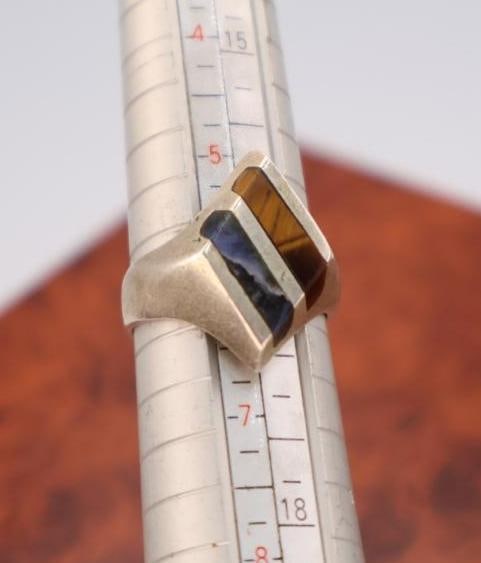 Two sterling silver rings - 5