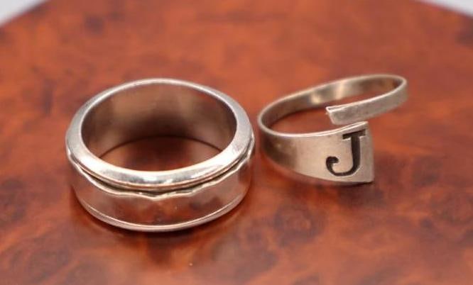 Silver spinner ring and an adjustable initial ring (1 of 9)