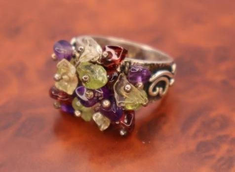 These are sterling silver rings with semi-precious stones - 10