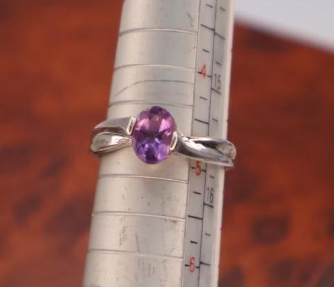 These are sterling silver rings with semi-precious stones - 6