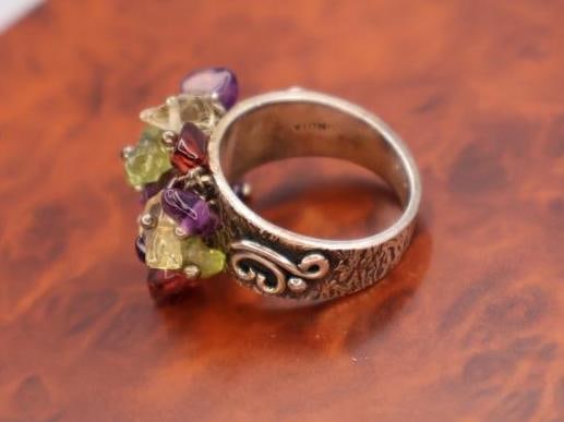 These are sterling silver rings with semi-precious stones - 9