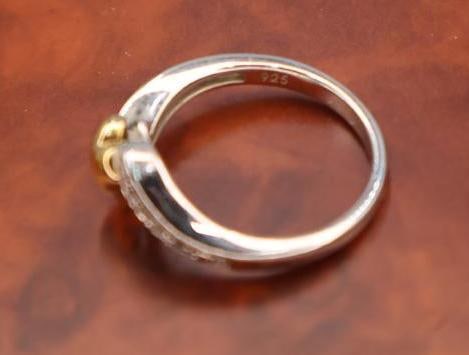 A pair of sterling silver rings - 7