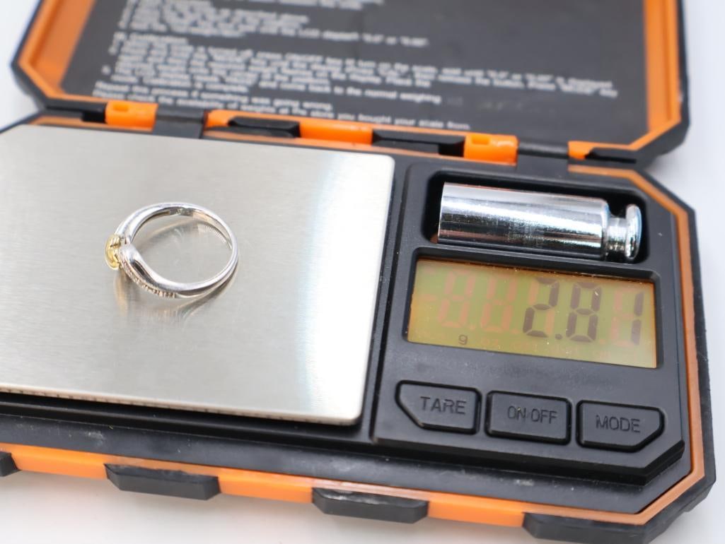 A pair of sterling silver rings - 9