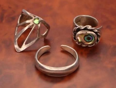 Three silver ear cuffs: Click on the main photo to view more photos of this lot. 