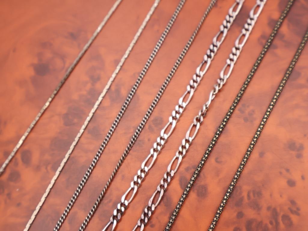 Four silver chains - 4