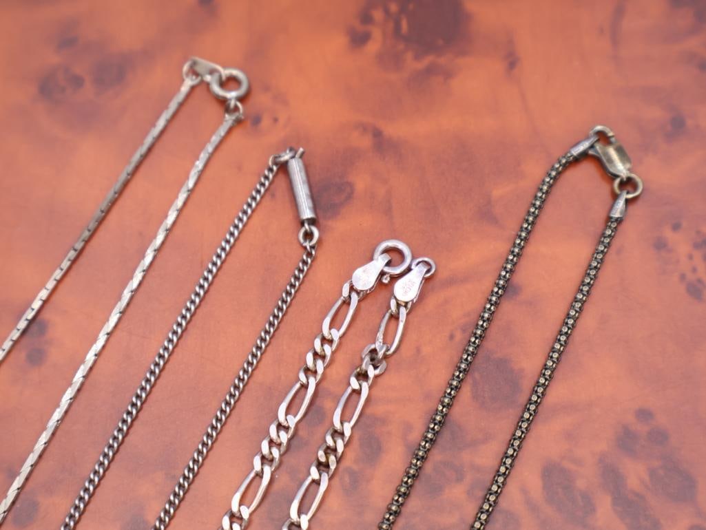 Four silver chains - 5