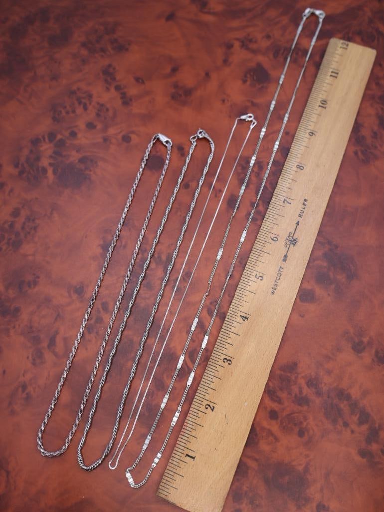 Four silver chains - 3