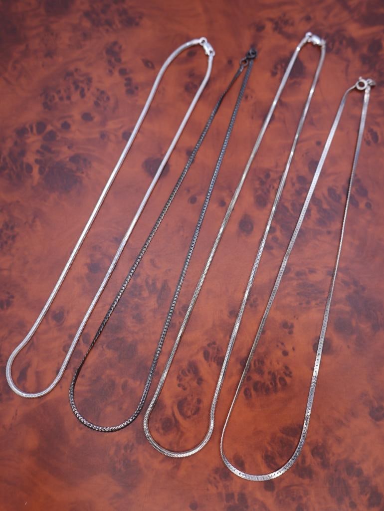 Four silver chains (1 of 11)